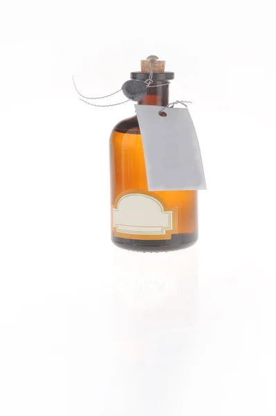 Botella con media cosmética — Foto de Stock