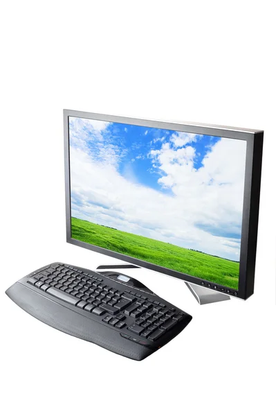 Monitor und schwarze Tastatur — Stockfoto