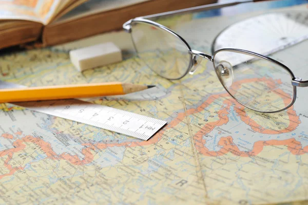Map and glasses — Stock Photo, Image