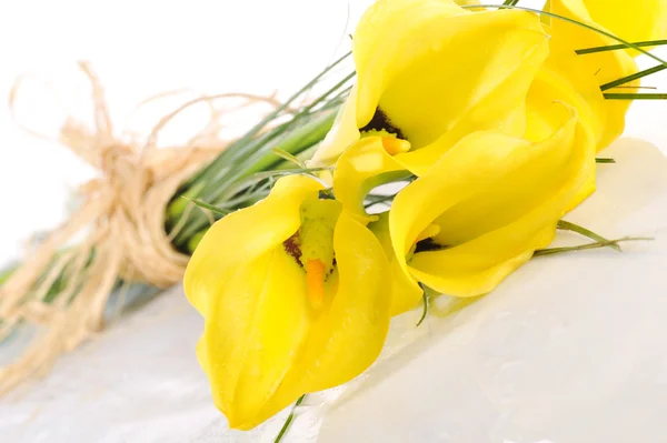 Stock image Bouquet from five yellow calla lilies