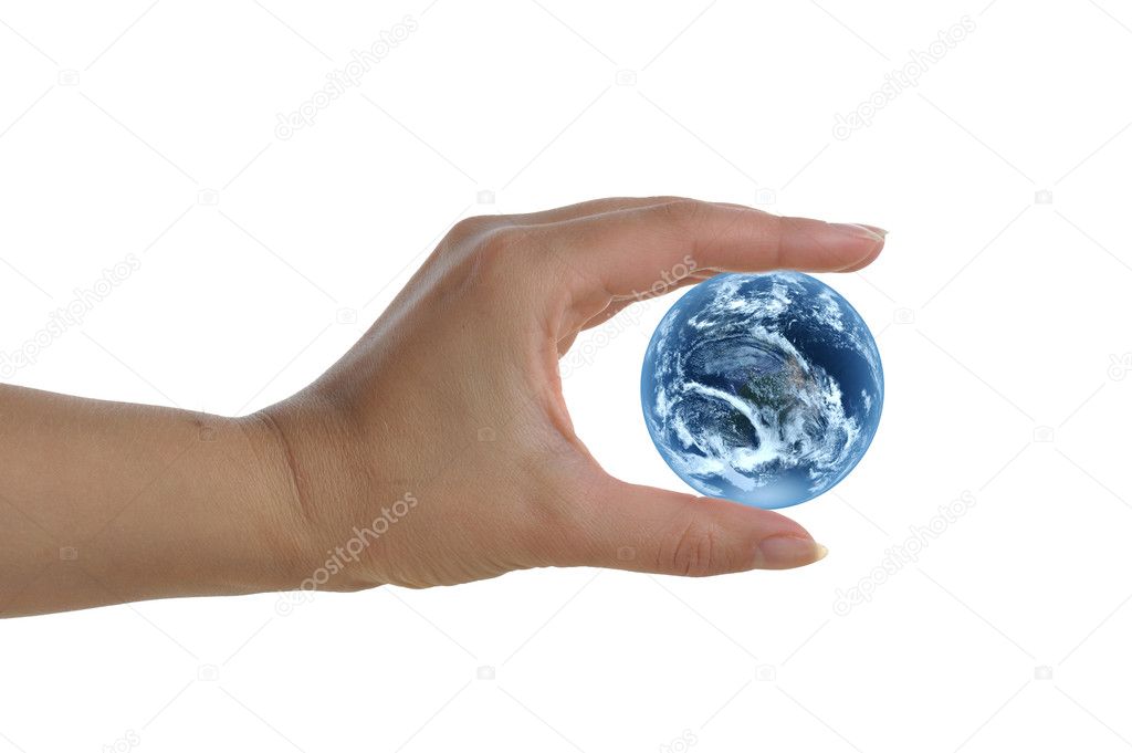 Womans hand holding earth