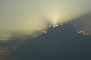 Sun through clouds clipart