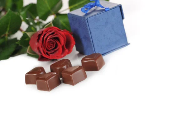 Rose and gifts in box — Stock Photo, Image