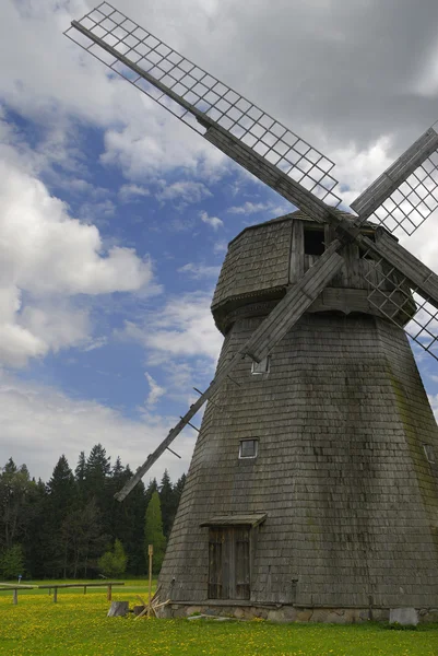 Old mill at dandelion field — Stock Photo, Image