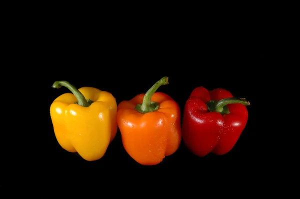Paprika rosse, arancioni e gialle — Foto Stock