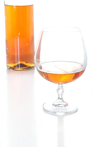 Stivale e bicchiere di brandy — Foto Stock