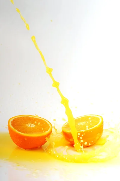 Salpicaduras de jugo de naranja — Foto de Stock