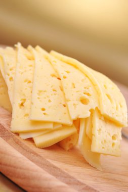 Sliced yellow cheese clipart