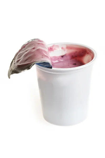 Tasty yoghurt in plastic glass — Stock Photo, Image