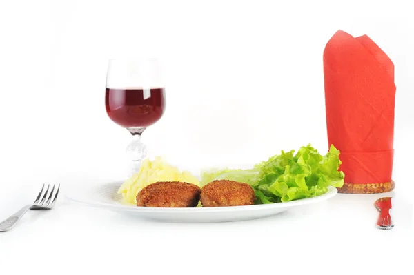 Roasted cutlets and red wine — Stock Photo, Image