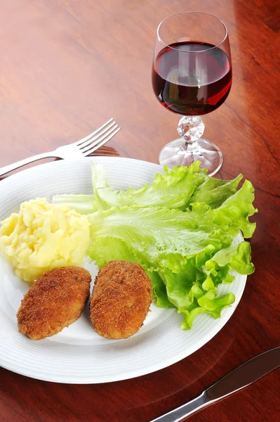 Roasted cutlets and wine Stock Image