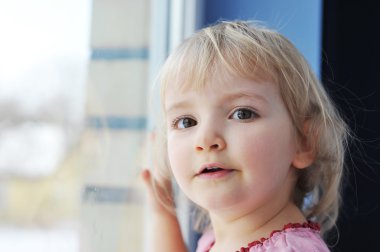 Girl by window clipart