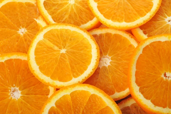 Fondo hecho de naranjas jugosas —  Fotos de Stock