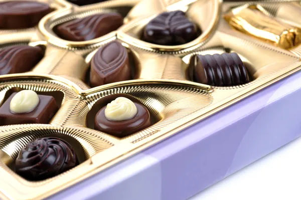 Chocolate en caja de cerca —  Fotos de Stock