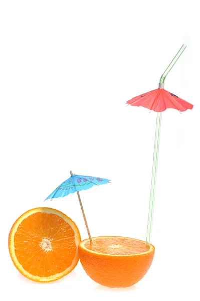 Sliced orange with coctail umbrella — Stock Photo, Image