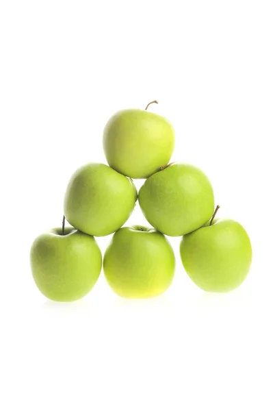 Piramide di mele su bianco — Foto Stock