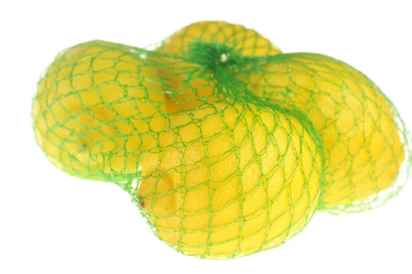 Limoni su bianco — Foto Stock