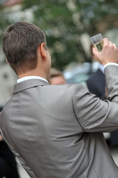 Groom with champagne — Stock Photo, Image