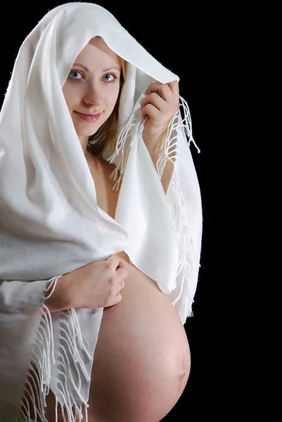 Femme enceinte isolée sur noir — Photo
