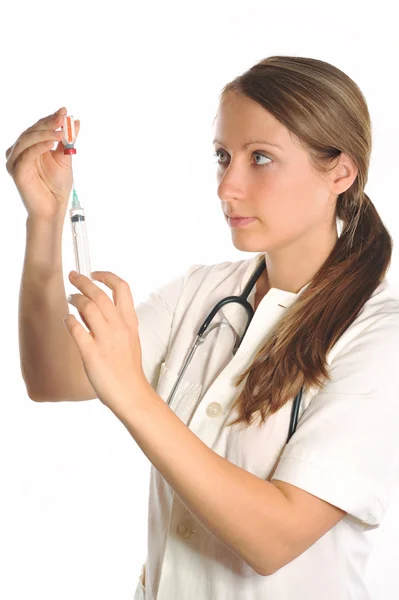 หมอผู้หญิงที่มีฉีดยา — ภาพถ่ายสต็อก