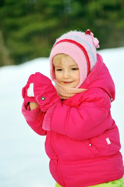 Girl in plays with snow — Stock Photo, Image