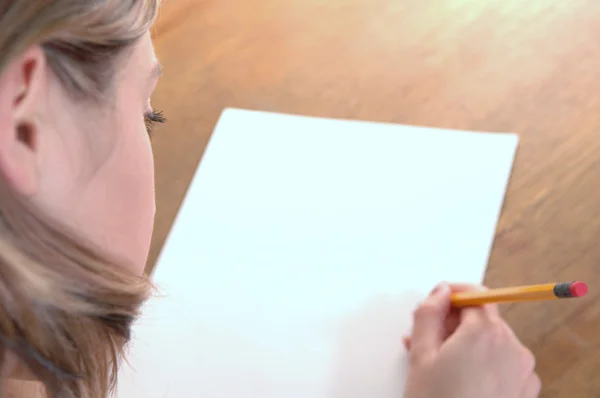 stock image Young woman with pencil