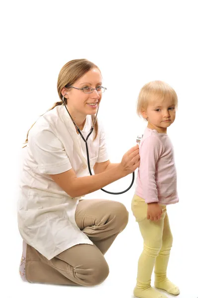 Doctor exams little girl — Stock Photo, Image