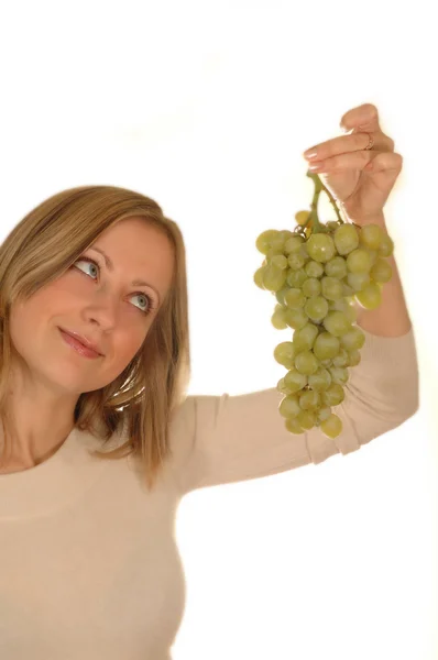 Young woman with grapes — Stock Photo, Image