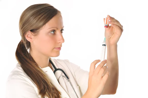 Woman doctor with syringe Stock Image
