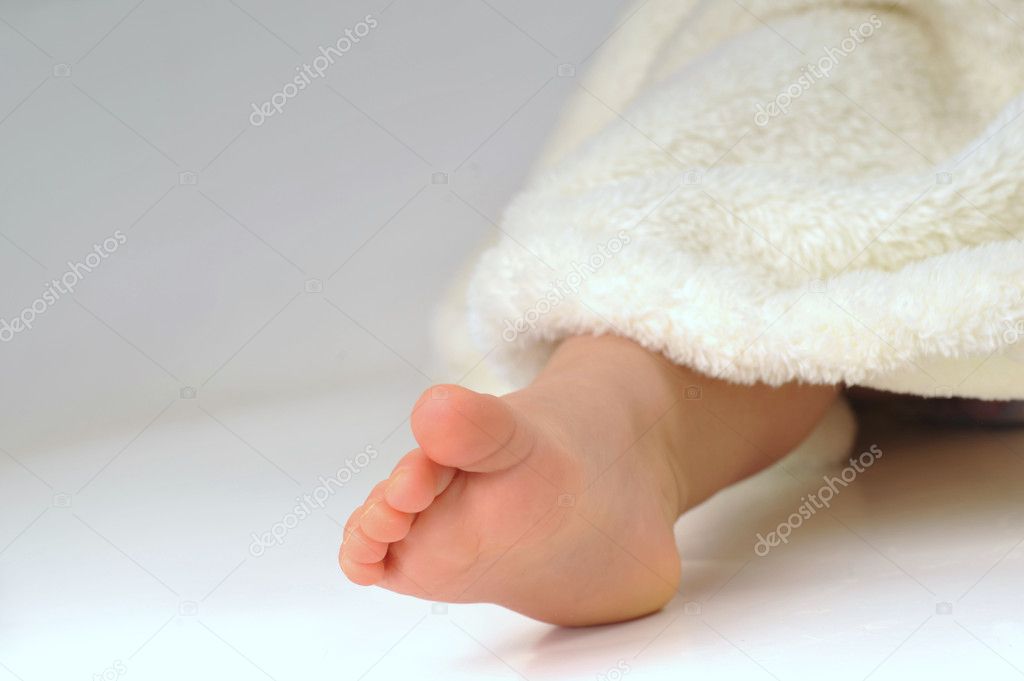 Feet of little girl