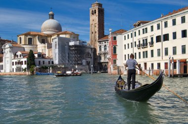 Gondolier at Grand canal clipart