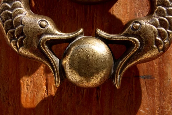 Detail of Metal knocker shaped two fish — Stock Photo, Image