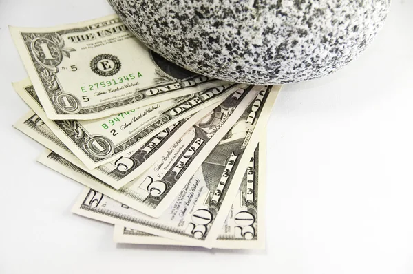 US 1,5,50 dollar bill and a rock — Stock Photo, Image