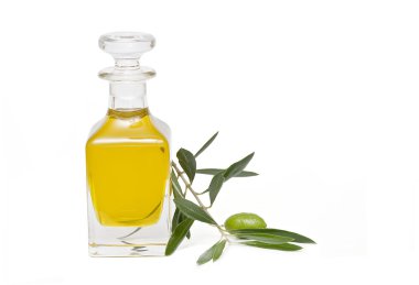 Olive oil bottle and olives. clipart