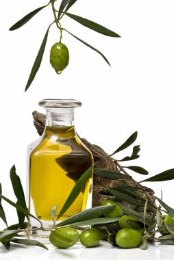 Olive oil dripping. clipart