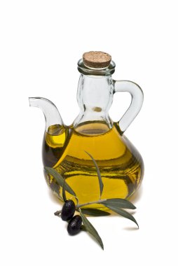 Olive oil bottle and olives. clipart