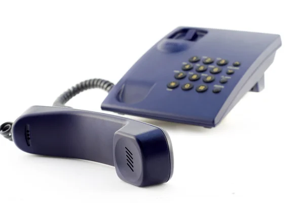 Изолированный синий телефон и телефон — стоковое фото