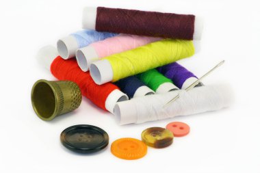 Multi-coloured threads and needles clipart