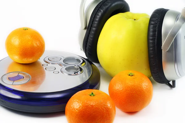Fruit listens to music — Stock Photo, Image