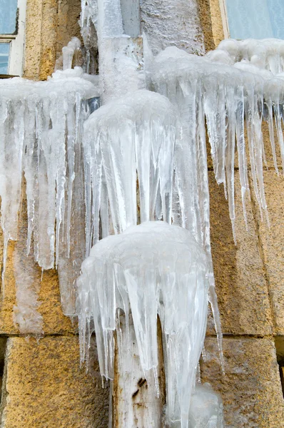 Icicles on gutter — Stock Photo, Image