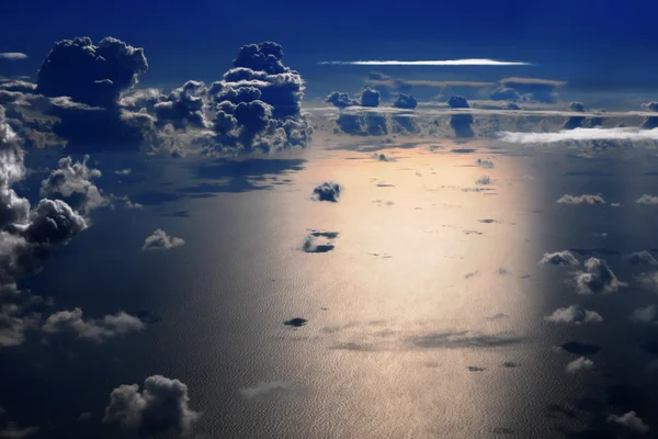 stock image Night flight over the sea