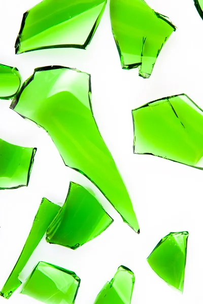 Green glass broken into slices — Stock Photo, Image