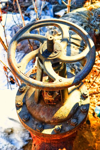 Old metal pipe with valve