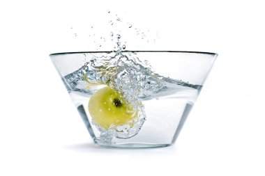 Apple falling into a container of water clipart
