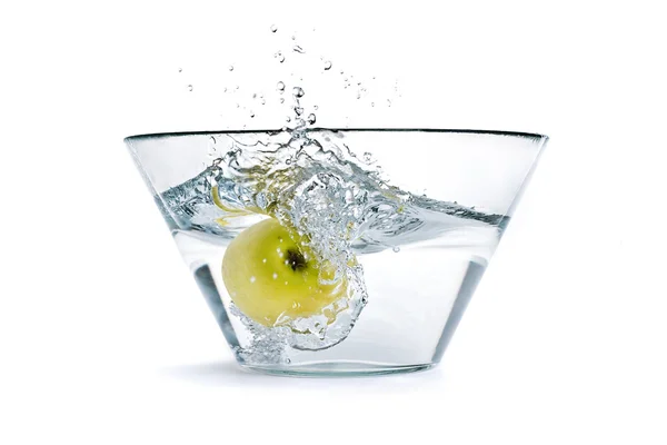 stock image Apple falling into a container of water