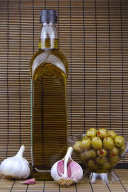 Olive oil bottle and olives clipart
