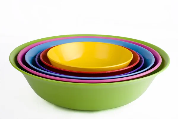 Colored plastic bowls — Stock Photo, Image