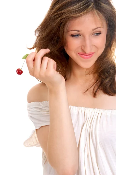 Chica joven sosteniendo una cereza — Foto de Stock