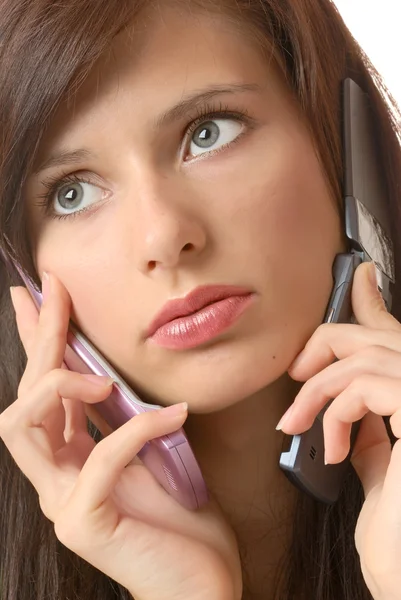 Girl with telephones — Stock Photo, Image