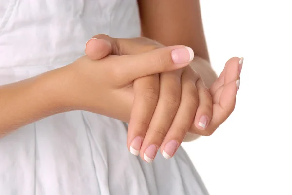 Girl hands on the white dress background — Stock Photo, Image